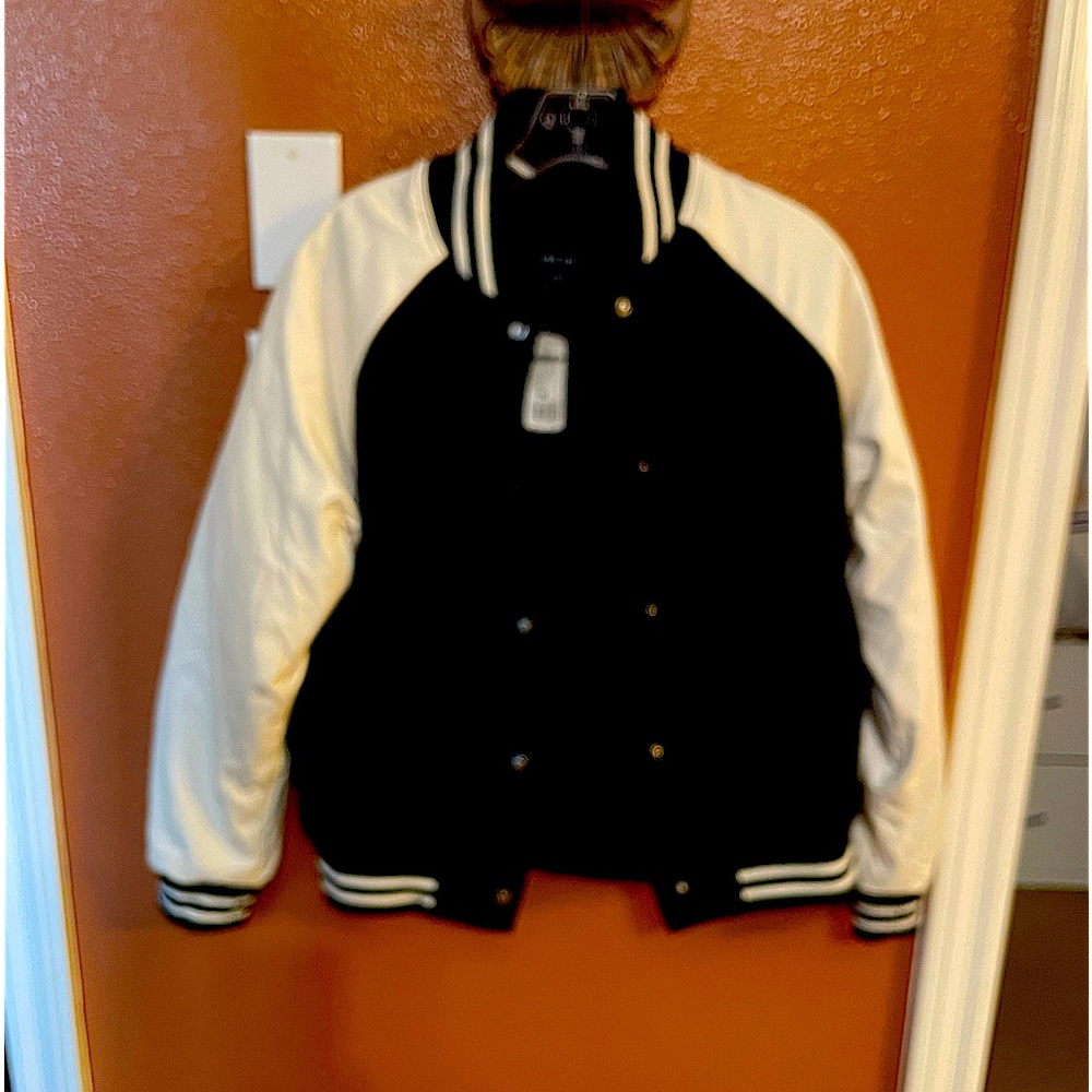 Teen girl’s letterman style jacket